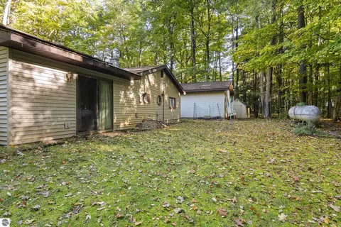 Exterior - 8702 Deadstream Rd, Honor, MI 49640 photo 8 of 10