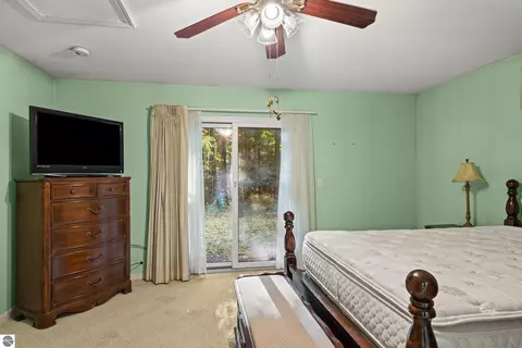 Bedroom - 8702 Deadstream Rd, Honor, MI 49640 photo 3 of 5