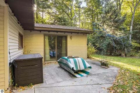 Exterior - 8702 Deadstream Rd, Honor, MI 49640 photo 7 of 10