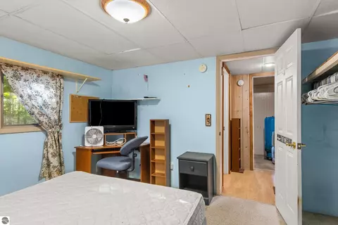 Bedroom - 8702 Deadstream Rd, Honor, MI 49640 photo 5 of 5