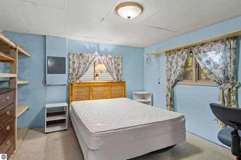 Bedroom - 8702 Deadstream Rd, Honor, MI 49640 photo 4 of 5