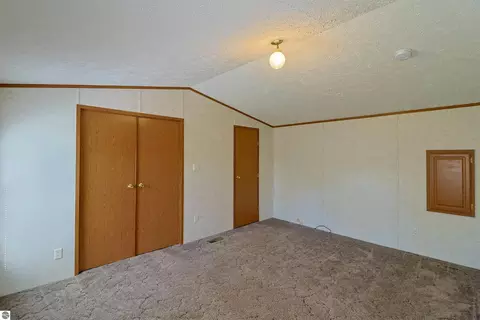 Bedroom - 6065 E Millbrook Rd, Mount Pleasant, MI 48858 photo 2 of 4
