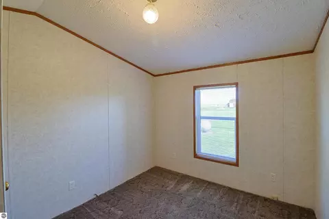 Bedroom - 6065 E Millbrook Rd, Mount Pleasant, MI 48858 photo 3 of 4