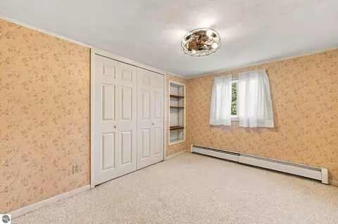 Bedroom - 406 E Third, Elk Rapids, MI 49629 photo 3 of 8