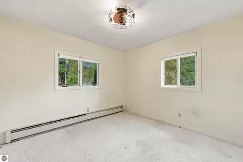 Bedroom - 406 E Third, Elk Rapids, MI 49629 photo 5 of 8