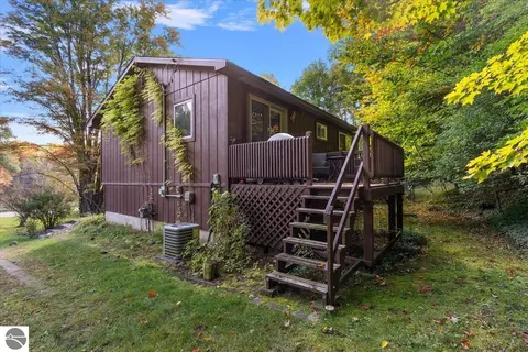 Exterior - 5331 Moore Rd, Williamsburg, MI 49690 photo 2 of 5