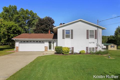 12778 Gregware Dr NE, Sand Lake, MI 49343 photo 1