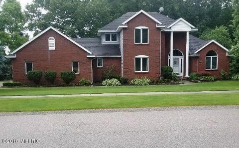 830 Pendleton Dr NE, Comstock Park, MI 49321 photo 1