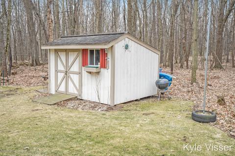 507 Roundtree Dr NE, Ada, MI 49301 photo 41