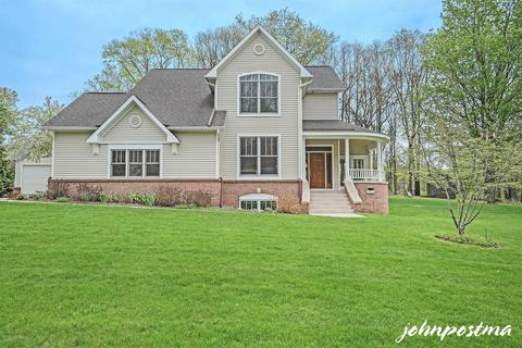 6564 Ada Dr SE, Ada, MI 49301 photo 1