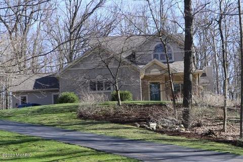519 Roundtree Dr NE, Ada, MI 49301 photo 1