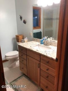 519 Roundtree Dr NE, Ada, MI 49301 photo 29