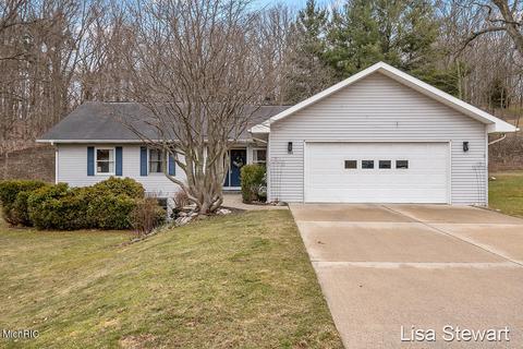 730 Ada Dr SE, Ada, MI 49301 photo 1