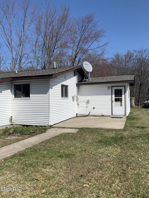 8680 Peninsula St, Sears, MI 49679 photo 1