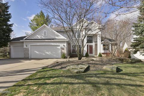 571 N Whitman Ct SE, Ada, MI 49301 photo 1