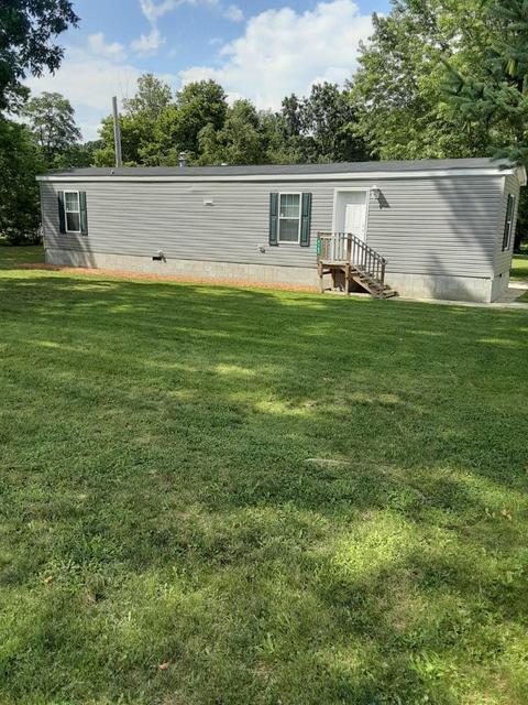 5793 E Riverside Dr, Lyons, MI 48851 photo 1