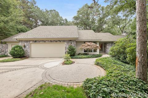 7665 Timber Bluff Rd SE, Ada, MI 49301 photo 1