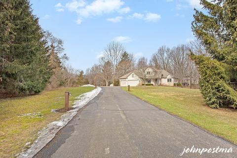145 Rollingbrook Dr NE, Ada, MI 49301 photo 2