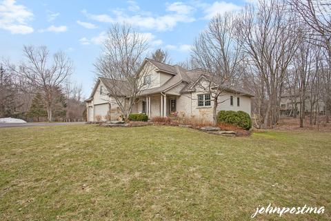 145 Rollingbrook Dr NE, Ada, MI 49301 photo 1