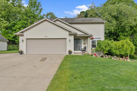 4016 Ronalds Rd, Dorr, MI 49323 photo 1