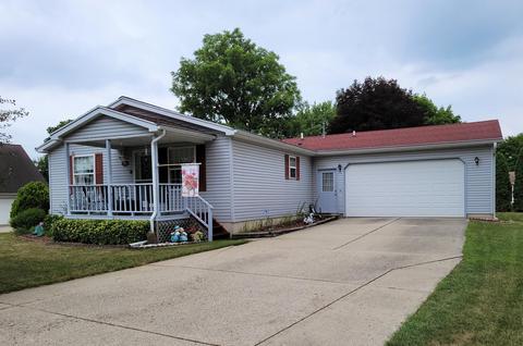 1064 Riverside Dr SE, Lowell, MI 49331 photo 1