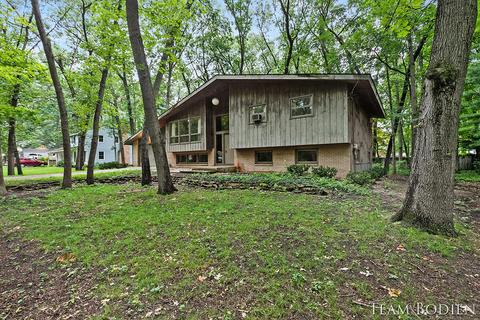 7379 Sheffield Dr SE, Ada, MI 49301 photo 2