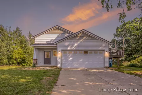 701 W Harmony Dr, Sparta, MI 49345