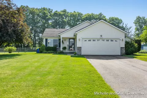 1302 Oxbow Dr, Middleville, MI 49333