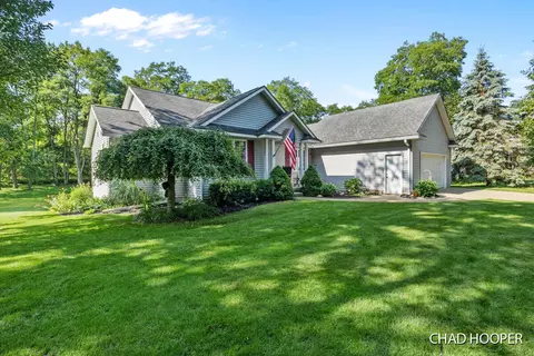 9737 Sandgrove Dr NE, Sparta, MI 49345