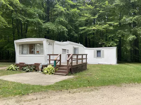 14365 S Wooded Acres, Sand Lake, MI 49343