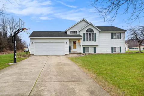 4002 Otuna Dr, Dorr, MI 49323
