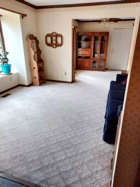Living - 845 E Wardlow Rd, Highland, MI 48356 photo 3 of 5