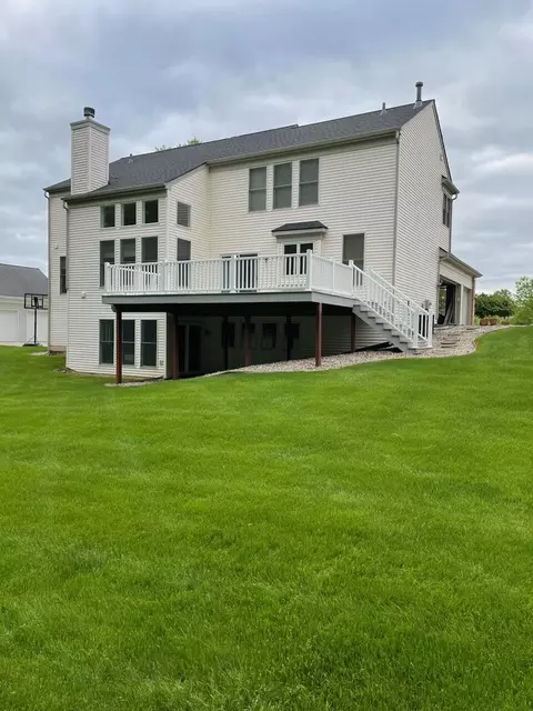 Exterior - 362 Oakwright Ct NE, Ada, MI 49301 photo 10 of 15