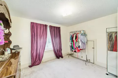 Bedroom - 271 7th St, Manistee, MI 49660 photo 4 of 7