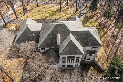 Exterior - 4844 Summer Ridge Ct NE, Ada, MI 49301 photo 13 of 17