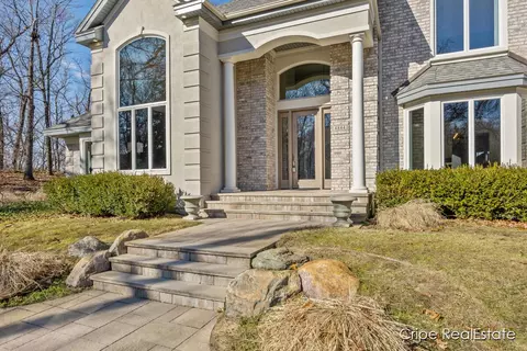 Exterior - 4844 Summer Ridge Ct NE, Ada, MI 49301 photo 4 of 17