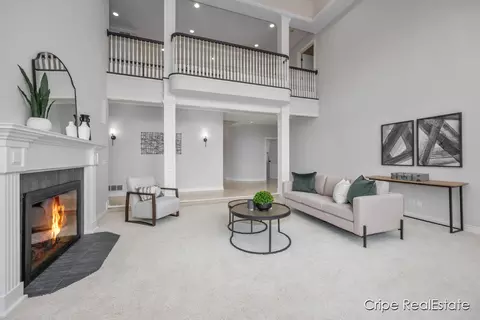 Living - 4844 Summer Ridge Ct NE, Ada, MI 49301 photo 4 of 11