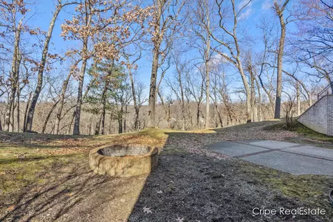 Exterior - 4844 Summer Ridge Ct NE, Ada, MI 49301 photo 12 of 17