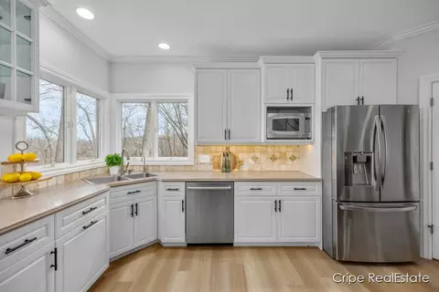 Kitchen - 4844 Summer Ridge Ct NE, Ada, MI 49301 photo 2 of 8