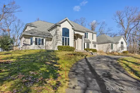Exterior - 4844 Summer Ridge Ct NE, Ada, MI 49301 photo 3 of 17
