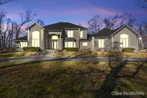 Exterior - 4844 Summer Ridge Ct NE, Ada, MI 49301 photo 2 of 17