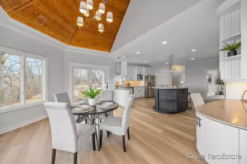 Dining - 4844 Summer Ridge Ct NE, Ada, MI 49301 photo 3 of 6