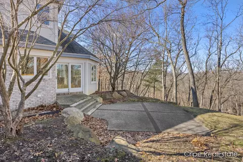 Exterior - 4844 Summer Ridge Ct NE, Ada, MI 49301 photo 9 of 17