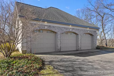 Exterior - 4844 Summer Ridge Ct NE, Ada, MI 49301 photo 8 of 17