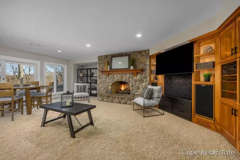 Living - 4844 Summer Ridge Ct NE, Ada, MI 49301 photo 9 of 11