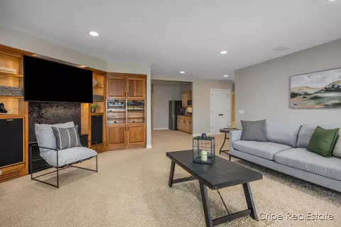 Living - 4844 Summer Ridge Ct NE, Ada, MI 49301 photo 8 of 11
