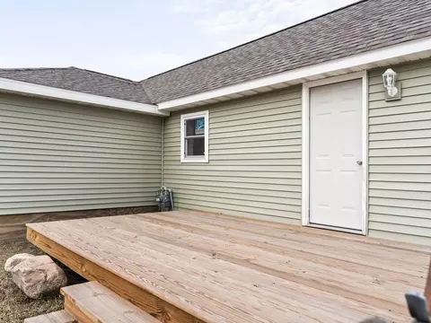 Exterior - 102 E Maple St, Mcbain, MI 49657 photo 9 of 11