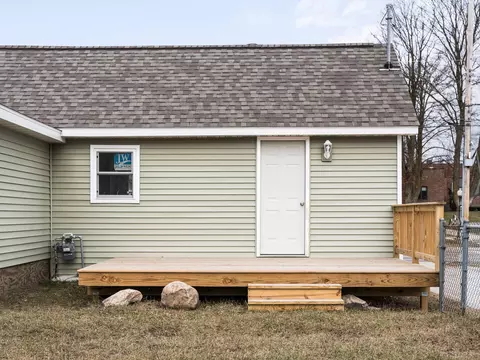 Exterior - 102 E Maple St, Mcbain, MI 49657 photo 5 of 11