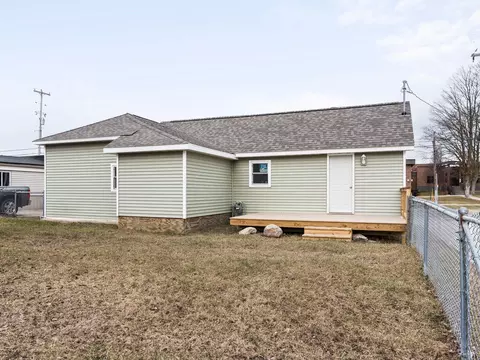 Exterior - 102 E Maple St, Mcbain, MI 49657 photo 3 of 11