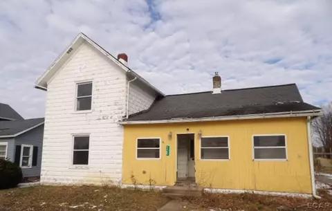 5460 Beecher Rd, Osseo, MI 49266